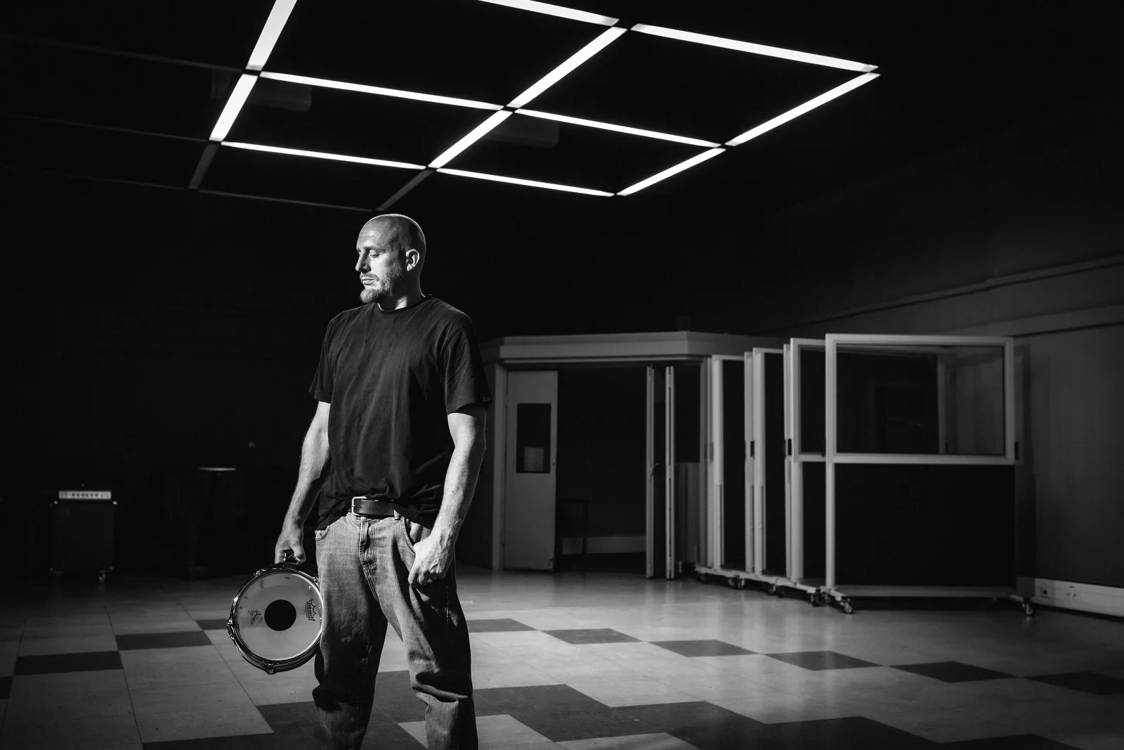 Timm Schreiner holding a snare drum in the live room